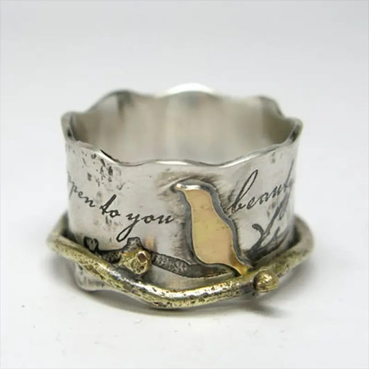 Custom-designed Retro Ring With A Wide Band And A Bird Motif